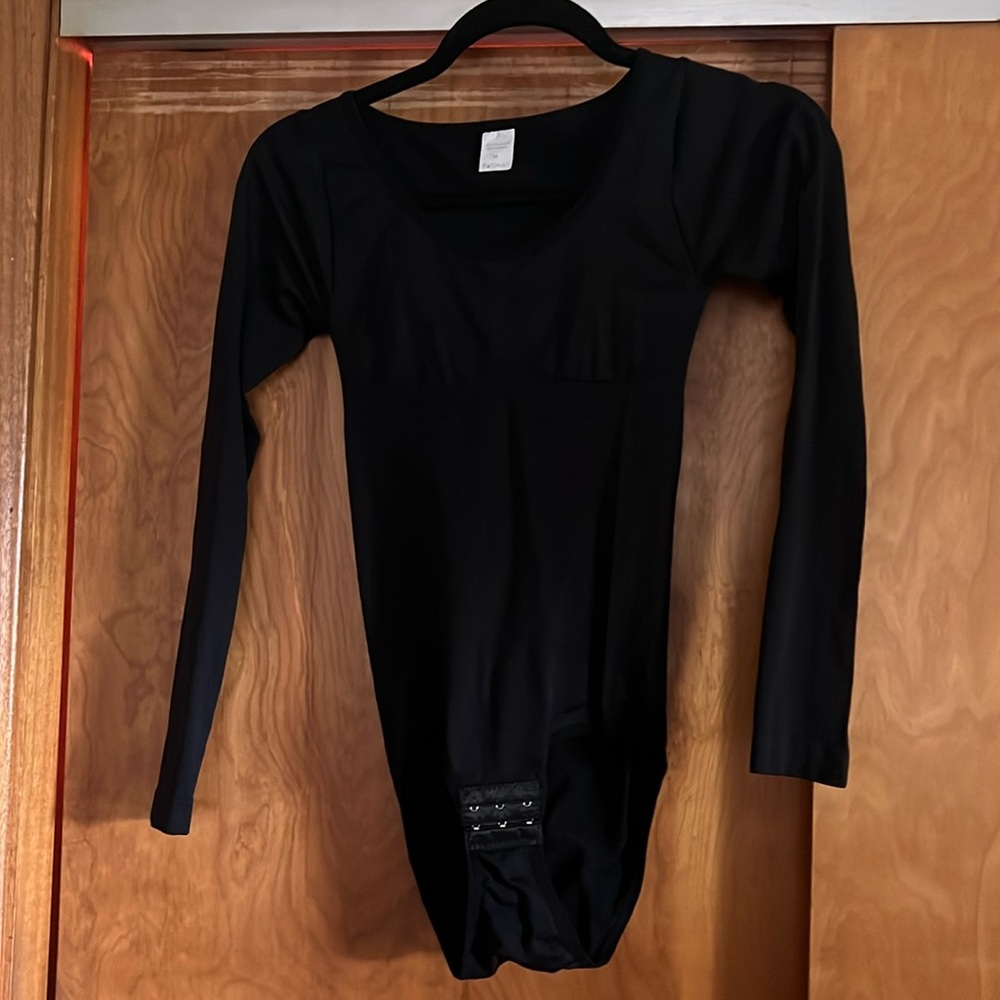 Black size M body suite. Never warn runs small.